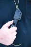 TOPS ALRT XL-05 compact fixed blade knife featuring a black hunter's point blade shape and black canvas micarta handles.