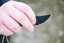 TOPS ALRT XL-05 compact fixed blade knife featuring a black hunter's point blade shape and black canvas micarta handles.