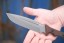 Viking Tactics Norseman knife with tan and green Micarta handle featuring blood red liners and Tungsten Cerakote blade.