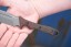 Viking Tactics Norseman knife with tan and green Micarta handle featuring blood red liners and Tungsten Cerakote blade.